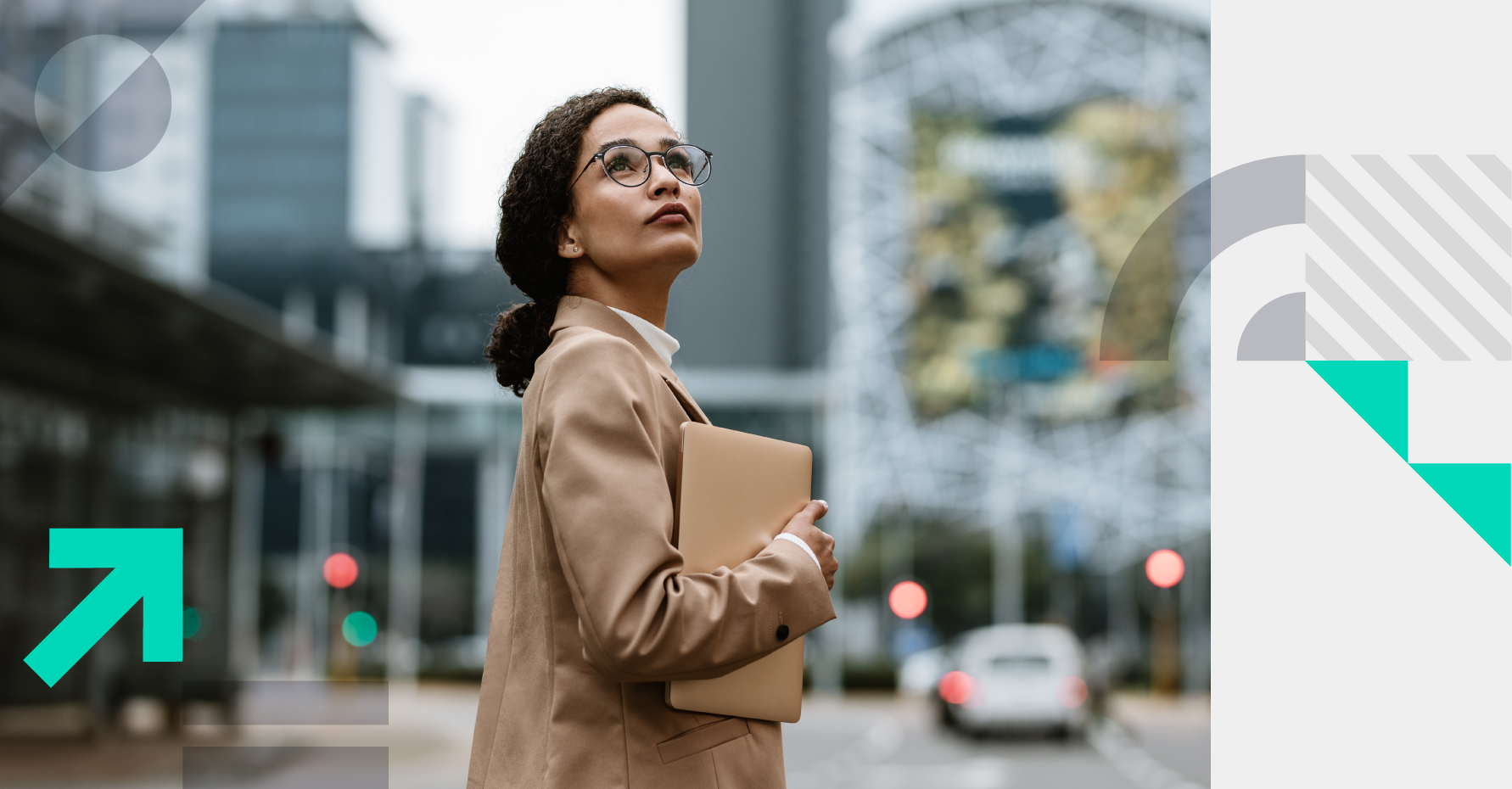 Photograph of a revenue leader looking up on a city street