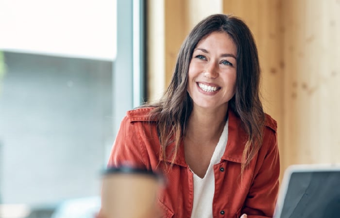 Photograph of a smiling financial services relationship manager